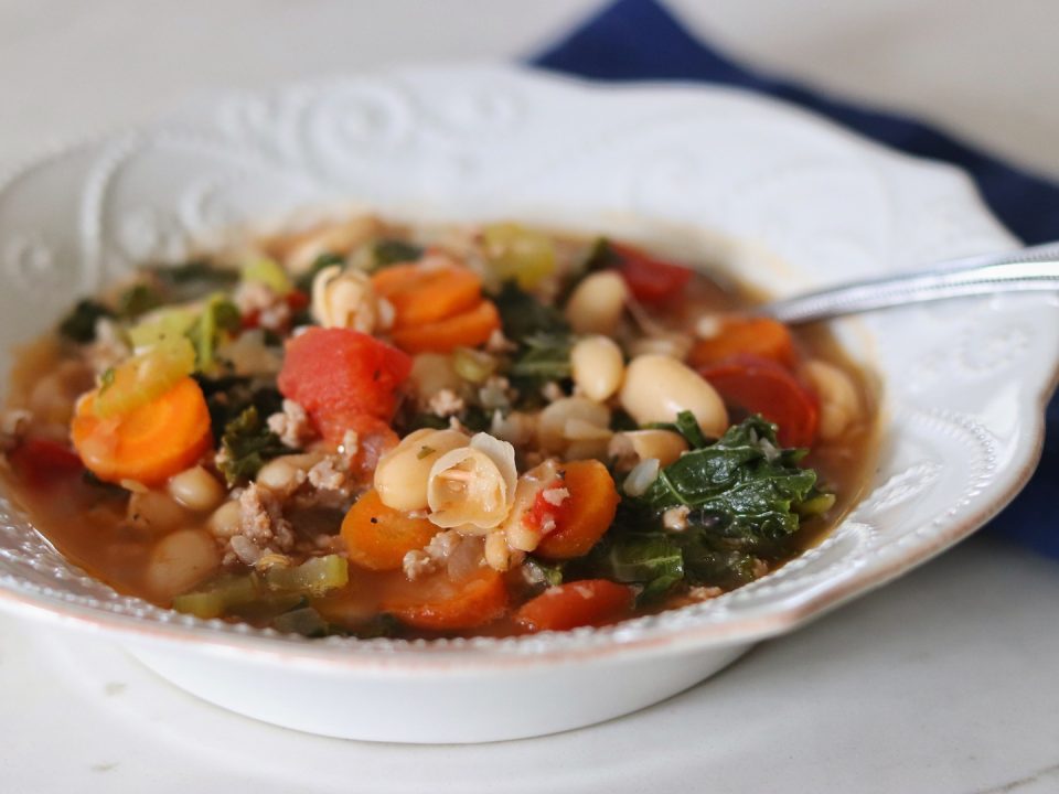 A bowl of Italian Turkey Sausage, Kale, and White Bean Soup