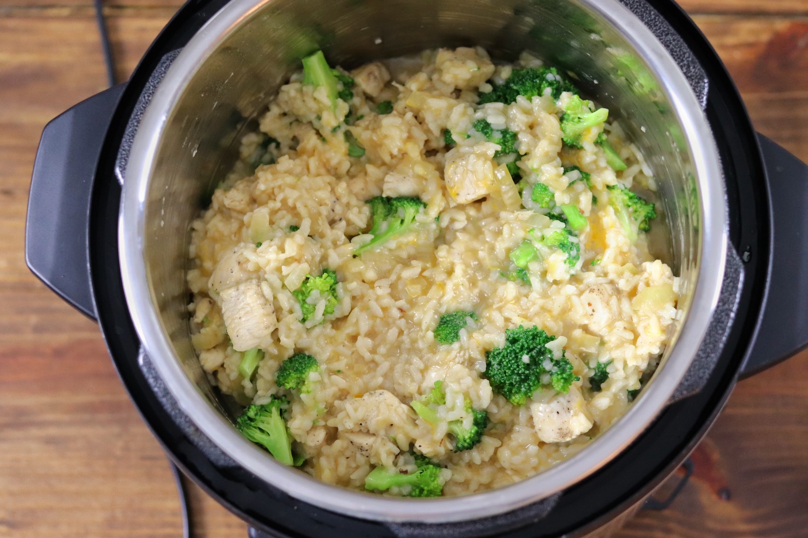 Instant Pot filled with Cheesy Chicken, Broccoli and Rice Recipe