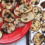 A baking sheet with Roasted Potato Chips with Preserved Lemon