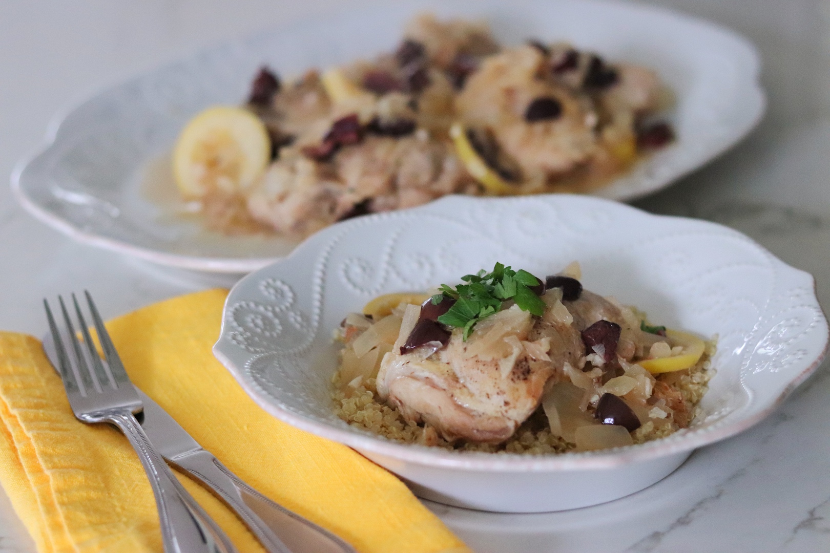 Bowl of Instant Pot Lemon Chicken with Olives