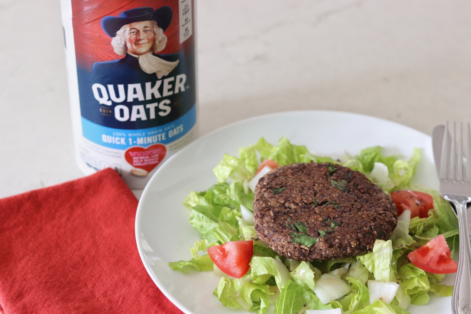 Quaker Oat Black Bean Vegetable Burger on a salad