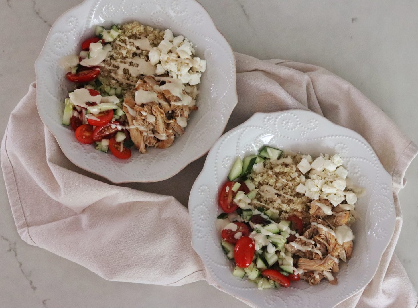 Two bowls of Instant Pot Greek Chicken Gyro Bowls