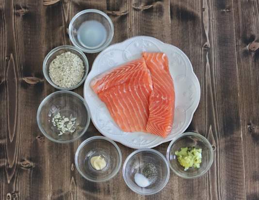 Ingredients for Salmon Burgers, including raw salmon, panko breadcrumbs, lemon juice, dill pickle relish, Dijon mustard, salt and pepper